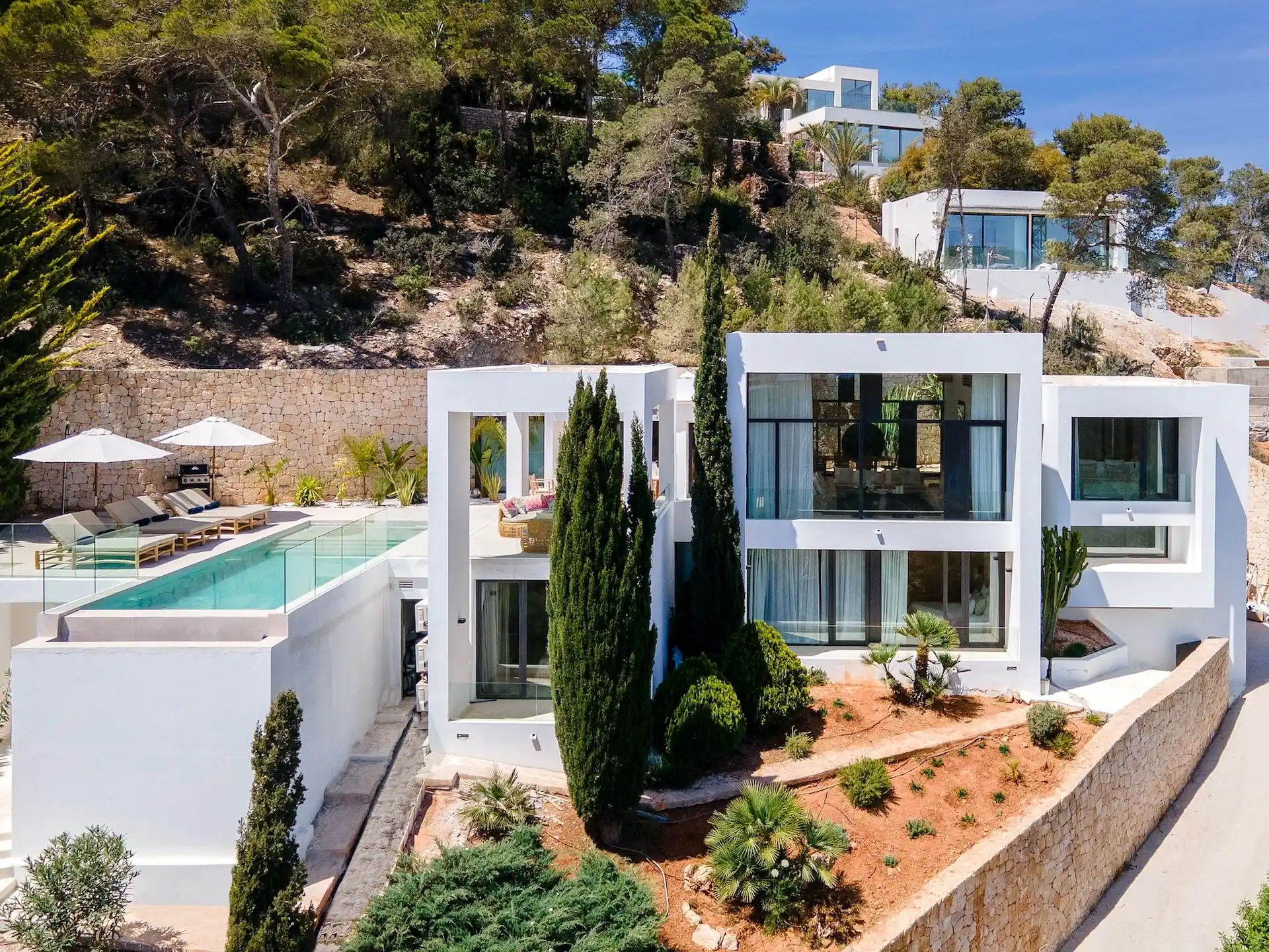 Modern architecture and sea view from the infinity pool, Villa Can Cypress, Ibiza